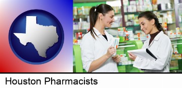 two pharmacists in a drug store in Houston, TX