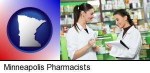 two pharmacists in a drug store in Minneapolis, MN