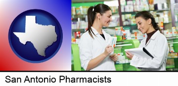 two pharmacists in a drug store in San Antonio, TX