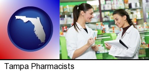 two pharmacists in a drug store in Tampa, FL