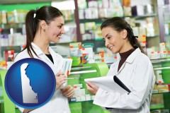 de map icon and two pharmacists in a drug store