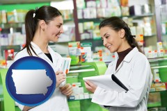 iowa two pharmacists in a drug store