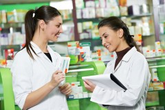 two pharmacists in a drug store