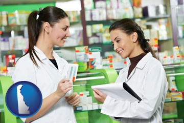 two pharmacists in a drug store - with Delaware icon