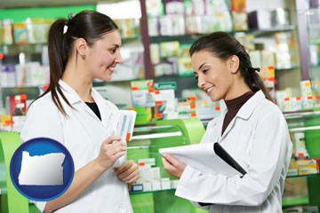 two pharmacists in a drug store - with Oregon icon